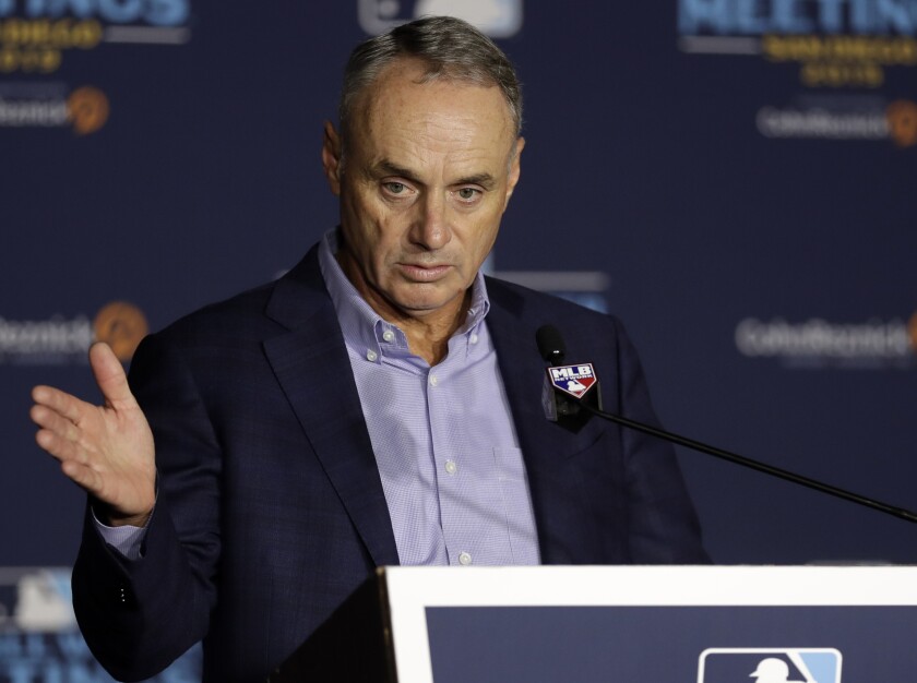 Commissioner Rob Manfred speaks during the Major League Baseball winter meetings Dec. 11 in San Diego.