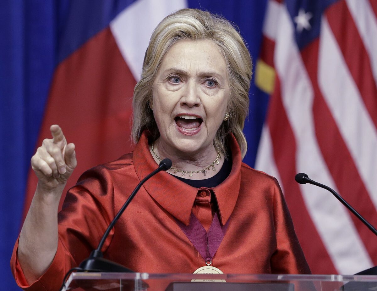 Democratic presidential candidate Hillary Rodham Clinton sharply criticized Republicans on the issue of voting rights in a speech at Texas Southern University in Houston on Thursday. She called for a system of automatic, universal voter registration.