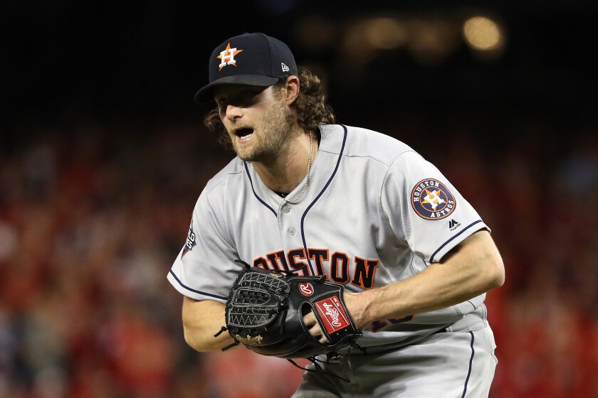 Gerrit Cole reacts after retiring the side for the Astros against the Nationals in Game 5 of the World Series on Oct. 27, 2019.