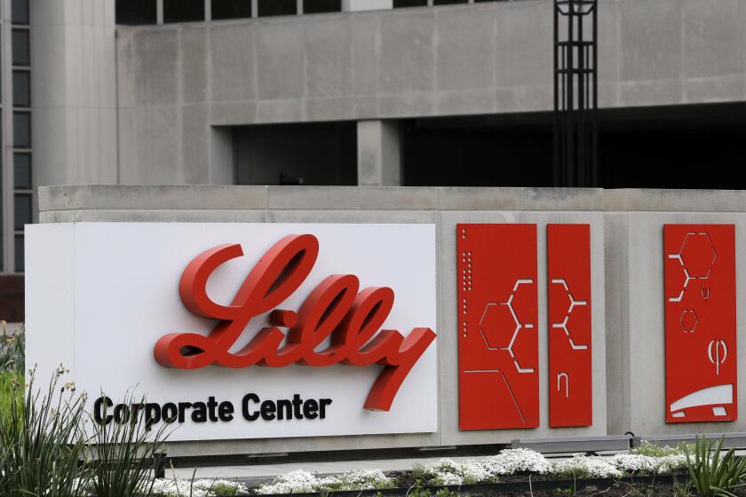 FILE - This April 26, 2017, file photo shows the Eli Lilly & Co. corporate headquarters in Indianapolis. Eli Lilly announced on Wednesday, March 1, 2023, will cut prices for some older insulins later this year, and immediately expand a cap on costs insured patients pay when they fill prescriptions. The moves promise critical relief to some people with diabetes who can face thousands of dollars a year in bills for insulin they need to live. (AP Photo/Darron Cummings, File)