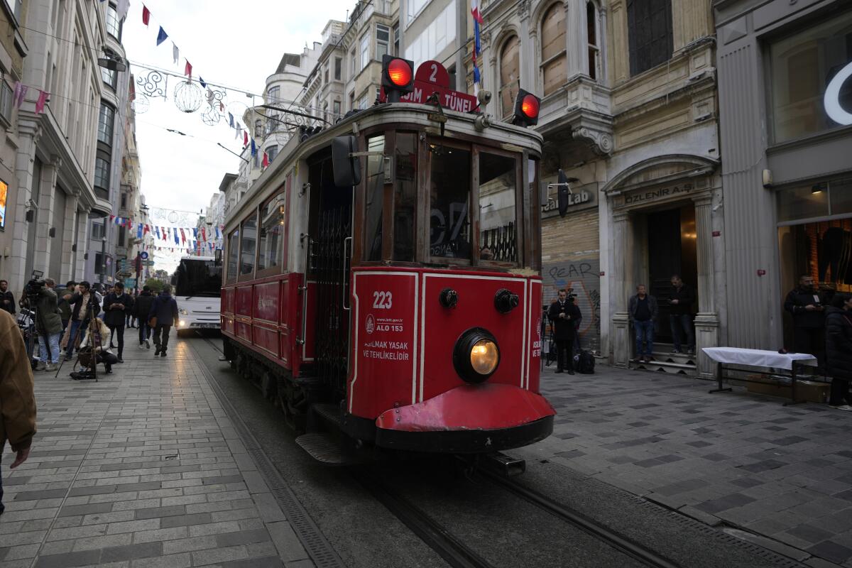 A trolley car in Istanbul's popular pedestrian Istiklal Avenue