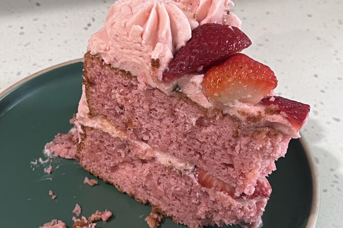 A slice of pink strawberry cake