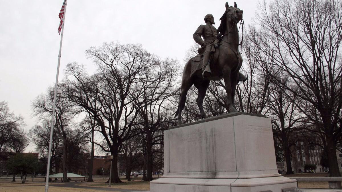 A statue of Nathan Bedford Forrest sits on a concrete pedestal on Feb. 6, 2013, at a park named after the Confederate cavalryman in Memphis, Tenn. (Adrian Sainz / Associated Press)