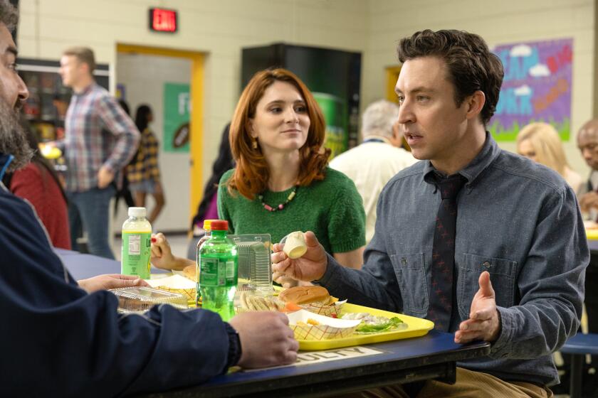 "ENGLISH TEACHER" -- "Pilot" -- Season 1, Episode 1 (Airs Sept 2) - Pictured (L-R): Stephanie Koenig as Gwen Sanders, Brian Jordan Alvarez as Evan Marquez. CR: Steve Swisher/FX