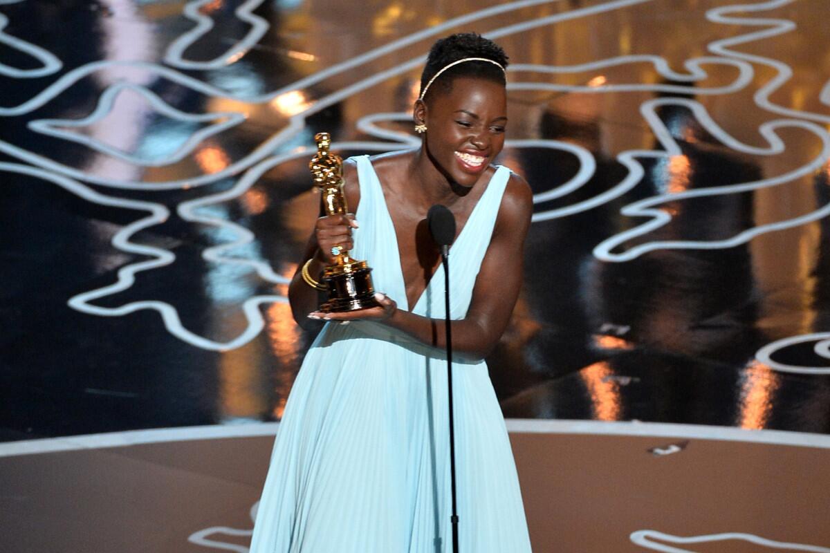 Actress Lupita Nyong'o accepts the Oscar for supporting actress for her role in "12 Years a Slave."