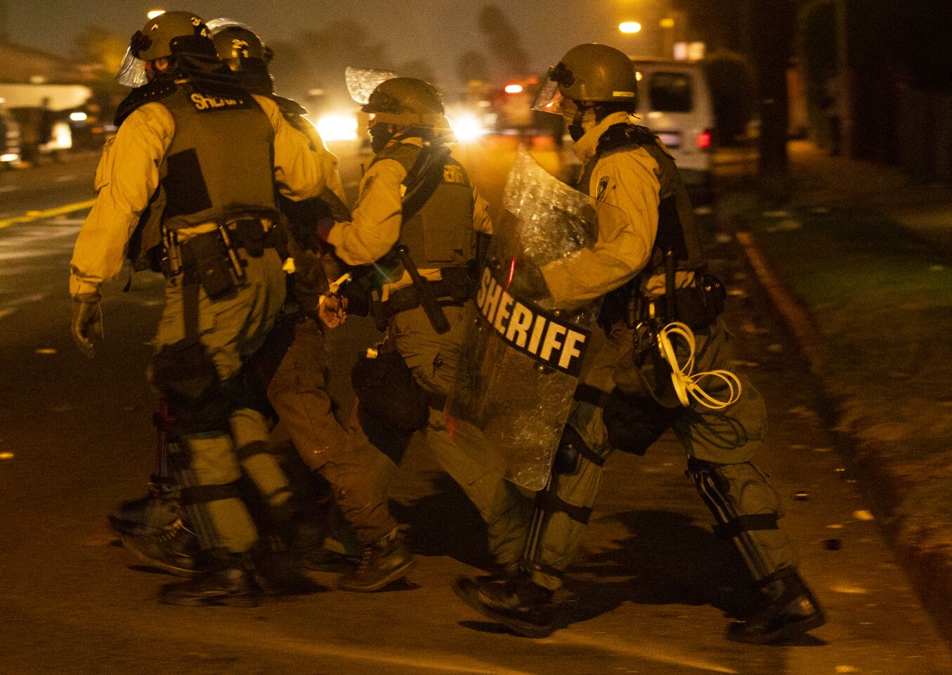 People taken into custody Tuesday in Los Angeles.