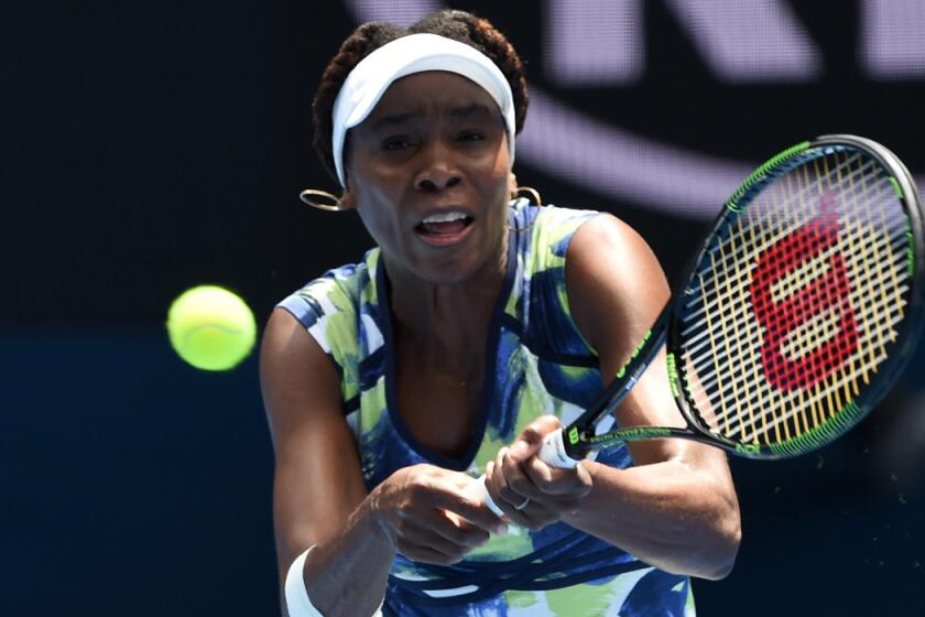 Venus Williams plays a backhand return during her women's singles match against Johanna Konta on Tuesday.