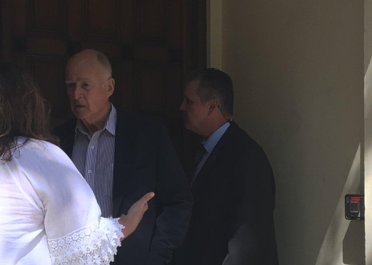 Gov. Jerry Brown leaves a meeting of the California State Assn. of Counties in Sacramento.