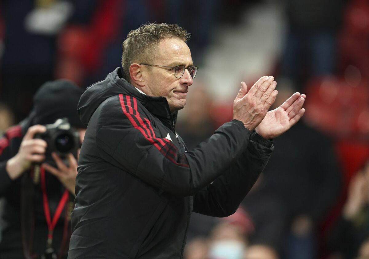 Manchester United's manager Ralf Rangnick celebrates at the end of the English Premier League soccer match between Manchester United and Crystal Palace at Old Trafford stadium in Manchester, England, Sunday, Dec. 5, 2021. (AP Photo/Jon Super)