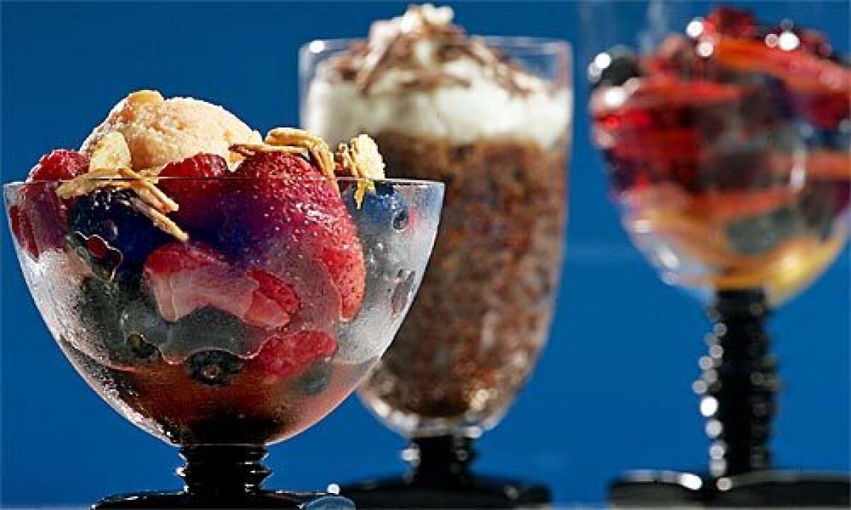 ICY OPTIONS: Peach sorbet takes candied almonds over the top, in the foreground; espresso granita with white chocolate cream and rosé jelly with fresh fruit stand to the right.