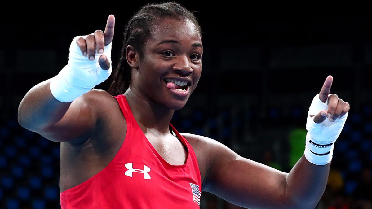 Claressa Shields has clinched the United States' third boxing medal at the Rio Olympics.