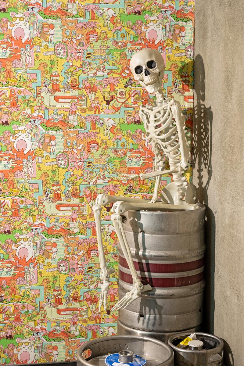 It's the skeleton crew: Find this guy sitting on a keg in the hallway at Button Mash.