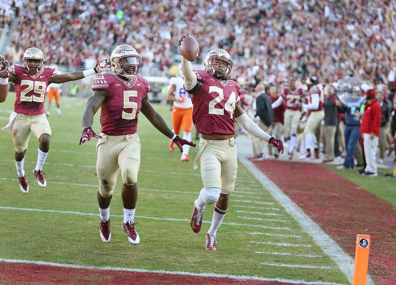 FSU linebacker Terrance Smith (24) runs a 95-yard interception return into the endzone for a touchdown during the Florida at Florida State college football game at Doak Campbell Stadium in Tallahassee