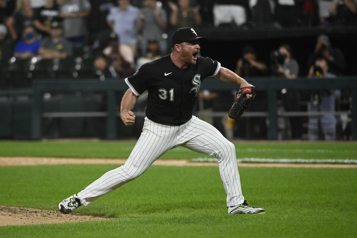 Chicago White Sox relief pitcher Liam Hendriks reacts at the end of the baseball game against the Oakland Athletics, Monday, Aug. 16, 2021, in Chicago. (AP Photo/Matt Marton)