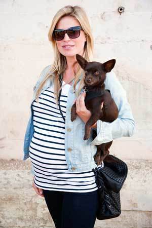By Colin Young-Wolff "I got this entire outfit from Gap because it's cheap maternity," says Melissa Keller, 32 of Silver Lake, posing with her 1-year-old chihuahua, Pepper Bear. "I don't wear your really nice clothes. I always get trashed at the dog park. One of my dogs likes to roll in mud and then she comes in the car and tries to get on my lap."