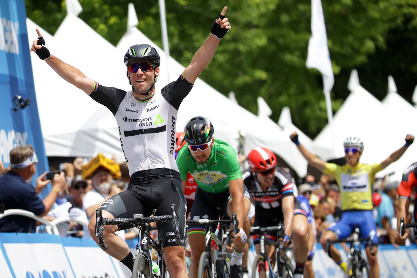 Mark Cavendish celebrates after winning the eighth and final stage of the Amgen Tour of California on May 22 in Sacramento.