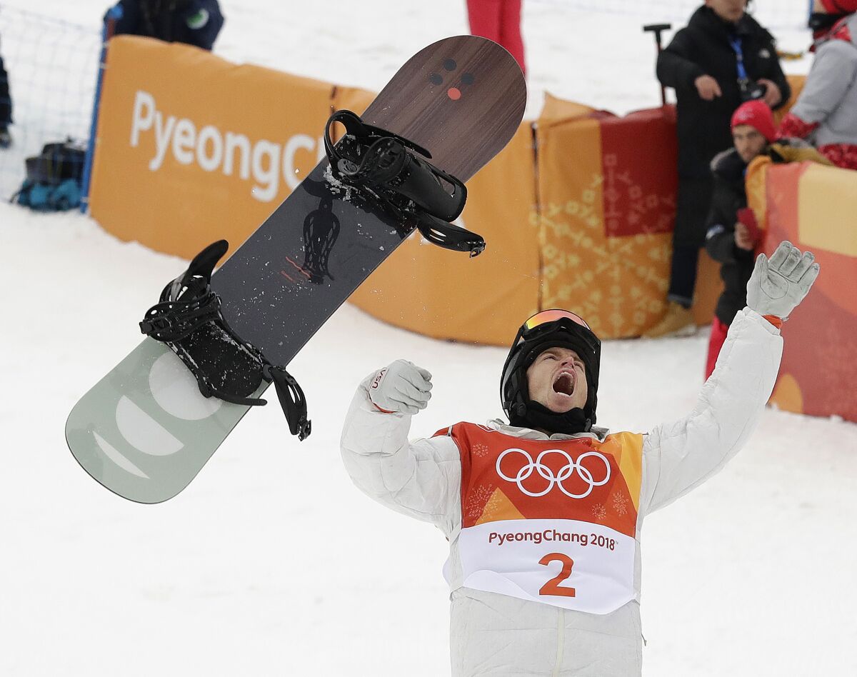 FILE - Shaun White, of the United States, celebrates winning gold after his run during the men's halfpipe finals at Phoenix Snow Park at the 2018 Winter Olympics in Pyeongchang, South Korea, Feb. 14, 2018. The Beijing Olympics will be the fifth Olympics for the three-time gold medalist. And the last Olympics for the 35-year-old — get this — elder-statesman who is now more than double the age of some of the riders he goes against. (AP Photo/Gregory Bull, File)