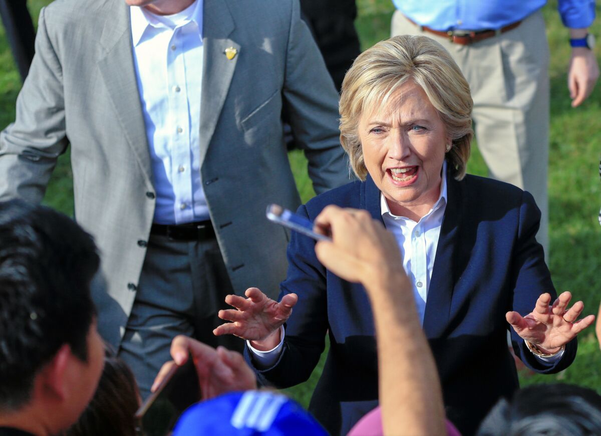 Democratic presidential candidate Hillary Rodham Clinton speaks with supporters on Oct. 7 after a campaign stop at the Westfair Amphitheater in Council Bluffs, Iowa.