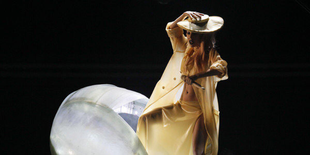 Lady Gaga performing in 2011. Development of a Gaga-based action figure has hit a legal snag.