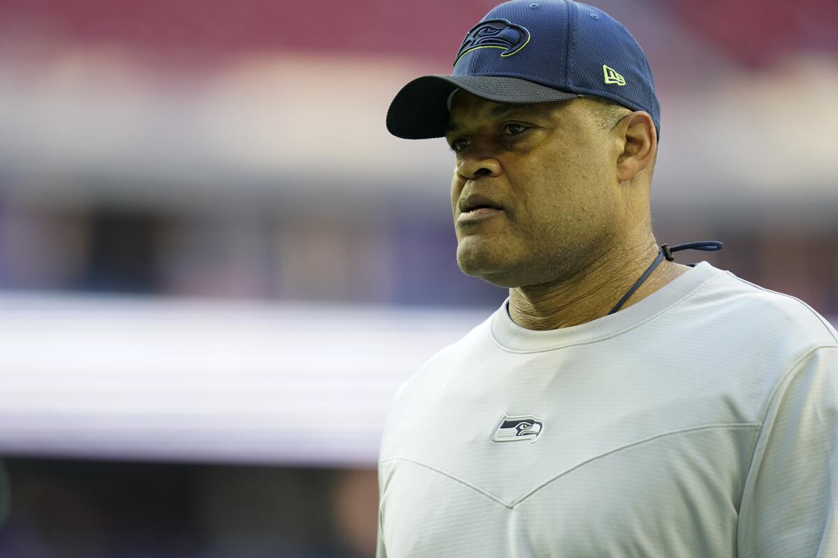 Seattle Seahawks defensive coordinator Ken Norton Jr. walks off the field after a game against the Houston Texans.