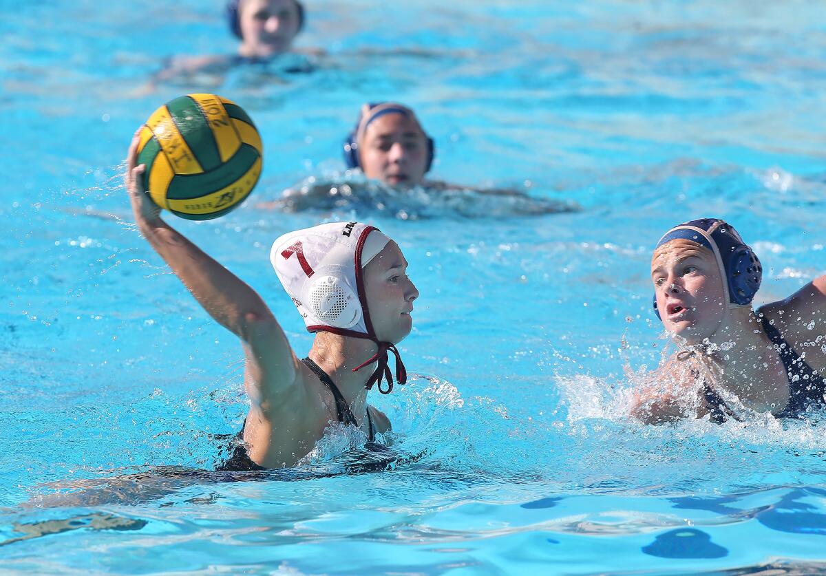 Laguna Beach's Grace Houlahan (7) scores against Dos Pueblos in the semifinals of the Irvine Southern California Championships on Jan. 26, 2019.