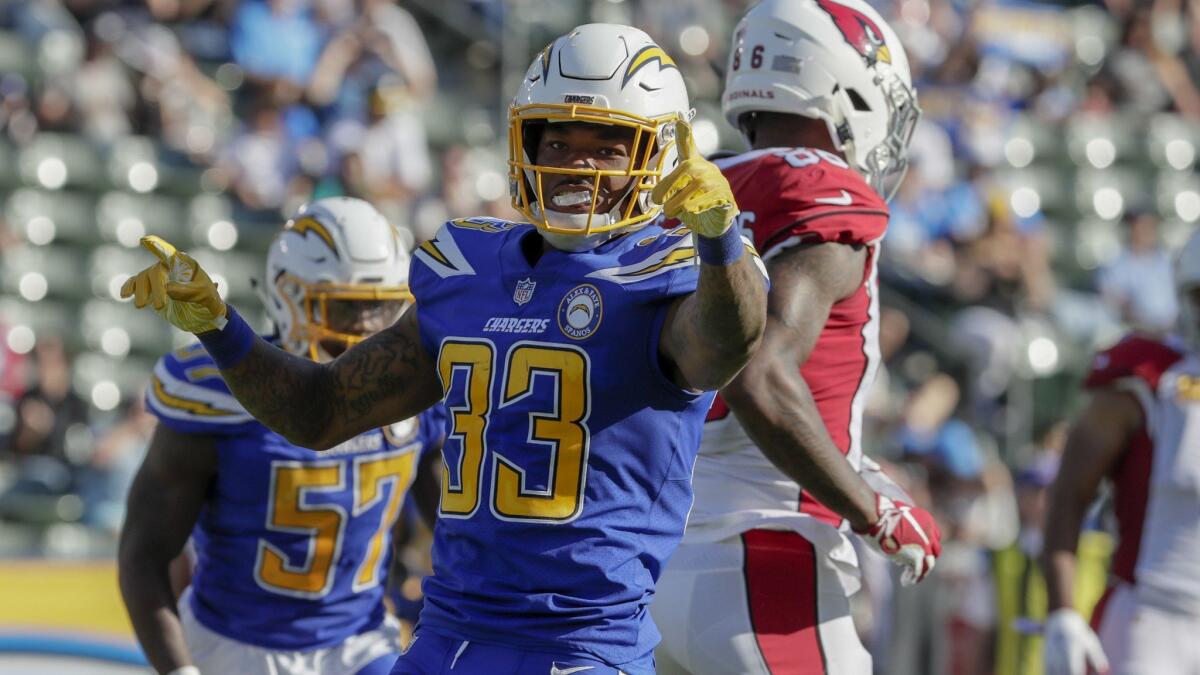 Chargers safety Derwin James celebrates after making a tackle against the Arizona Cardinals.