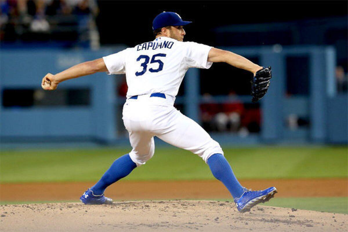 Dodgers' Chris Capuano throws a pitch against the Arizona Diamondbacks.
