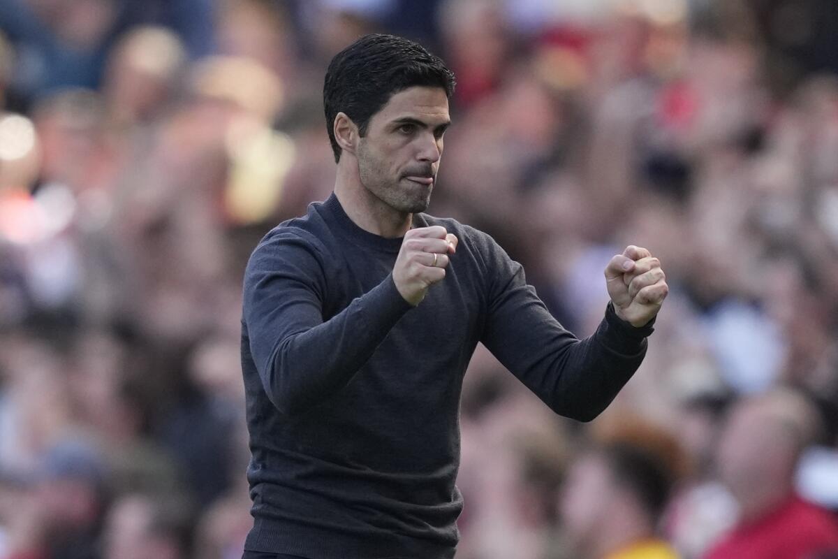 Arsenal's manager Mikel Arteta gestures during the English Premier League soccer match between Arsenal and Leeds United at the Emirates Stadium, in London Sunday, May 8, 2022. (AP Photo/Frank Augstein)