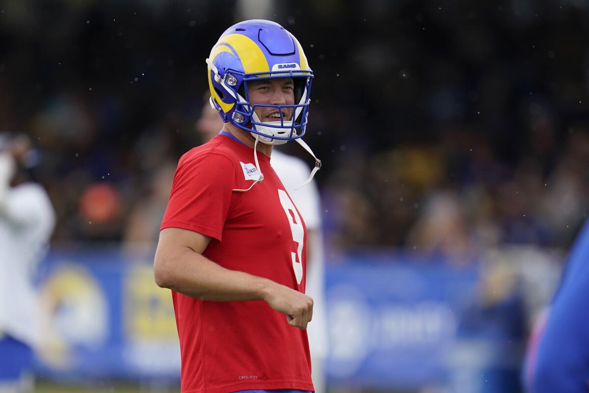 Rams quarterback Matthew Stafford watches training camp practice.