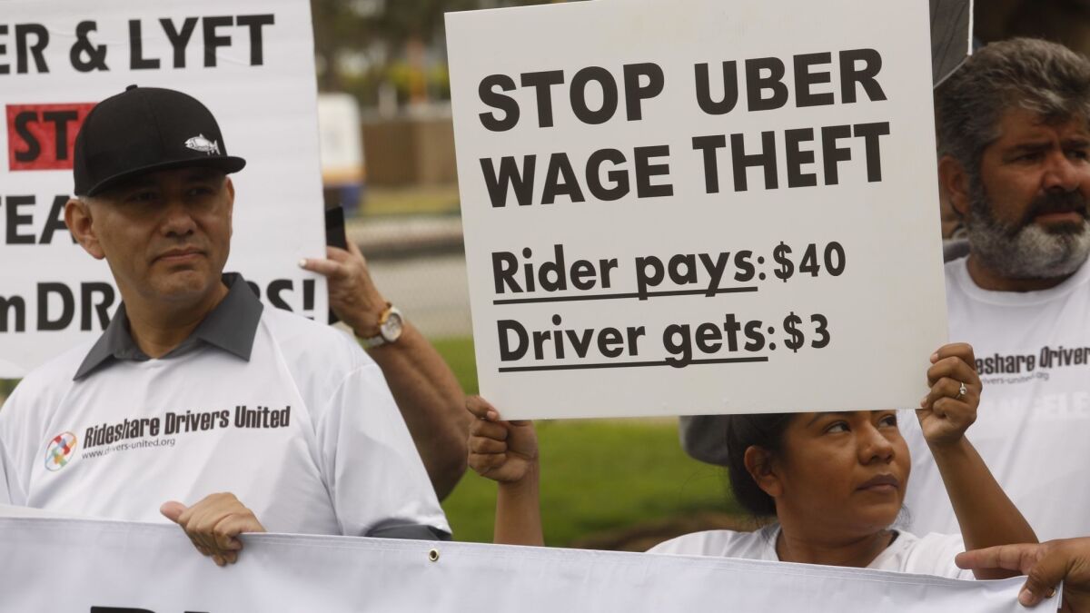 Uber and Lyft drivers protest for better wages near LAX