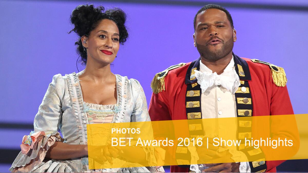Hosts Tracee Ellis Ross and Anthony Anderson perform a skit dressed as characters from the musical "Hamilton" at the BET Awards at the Microsoft Theater.