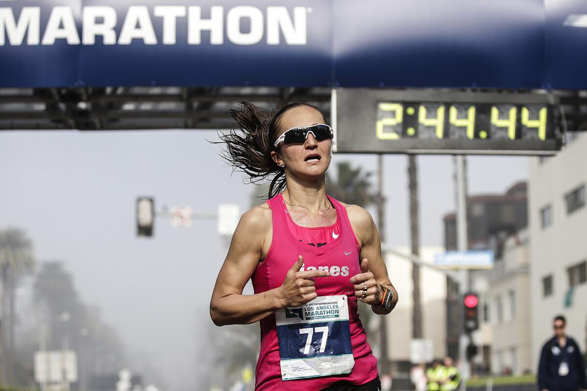 Julia Budniak finishes in third place in the L.A. Marathon women's race on Sunday.