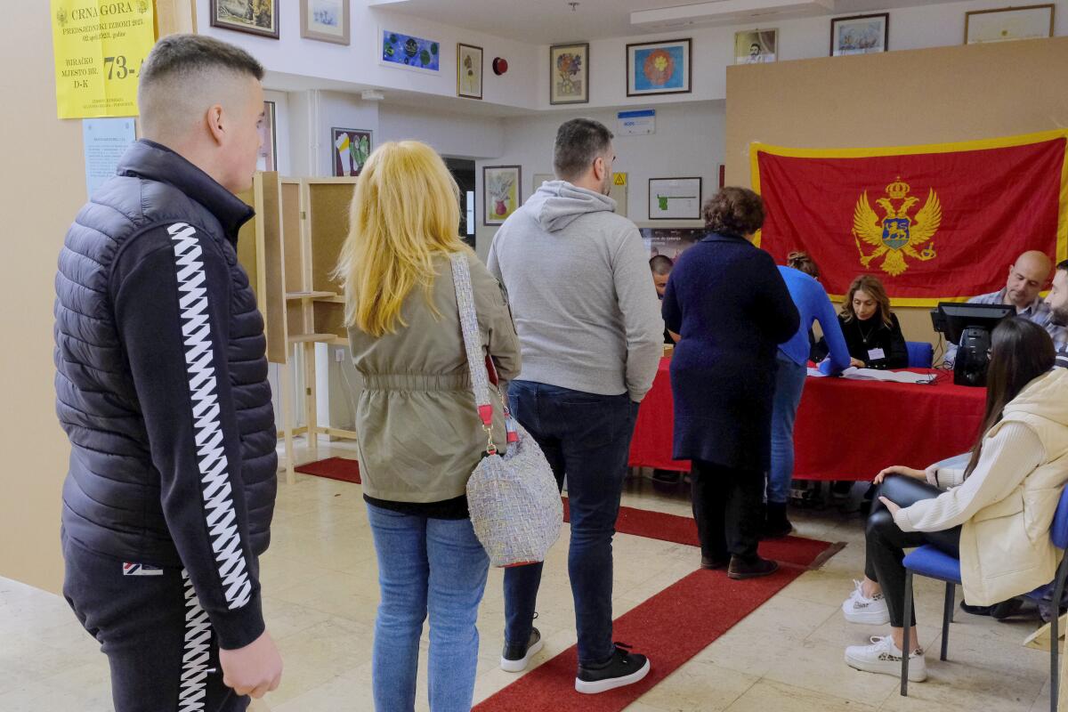 Voters in line in Montenegro's capital, Podgorica