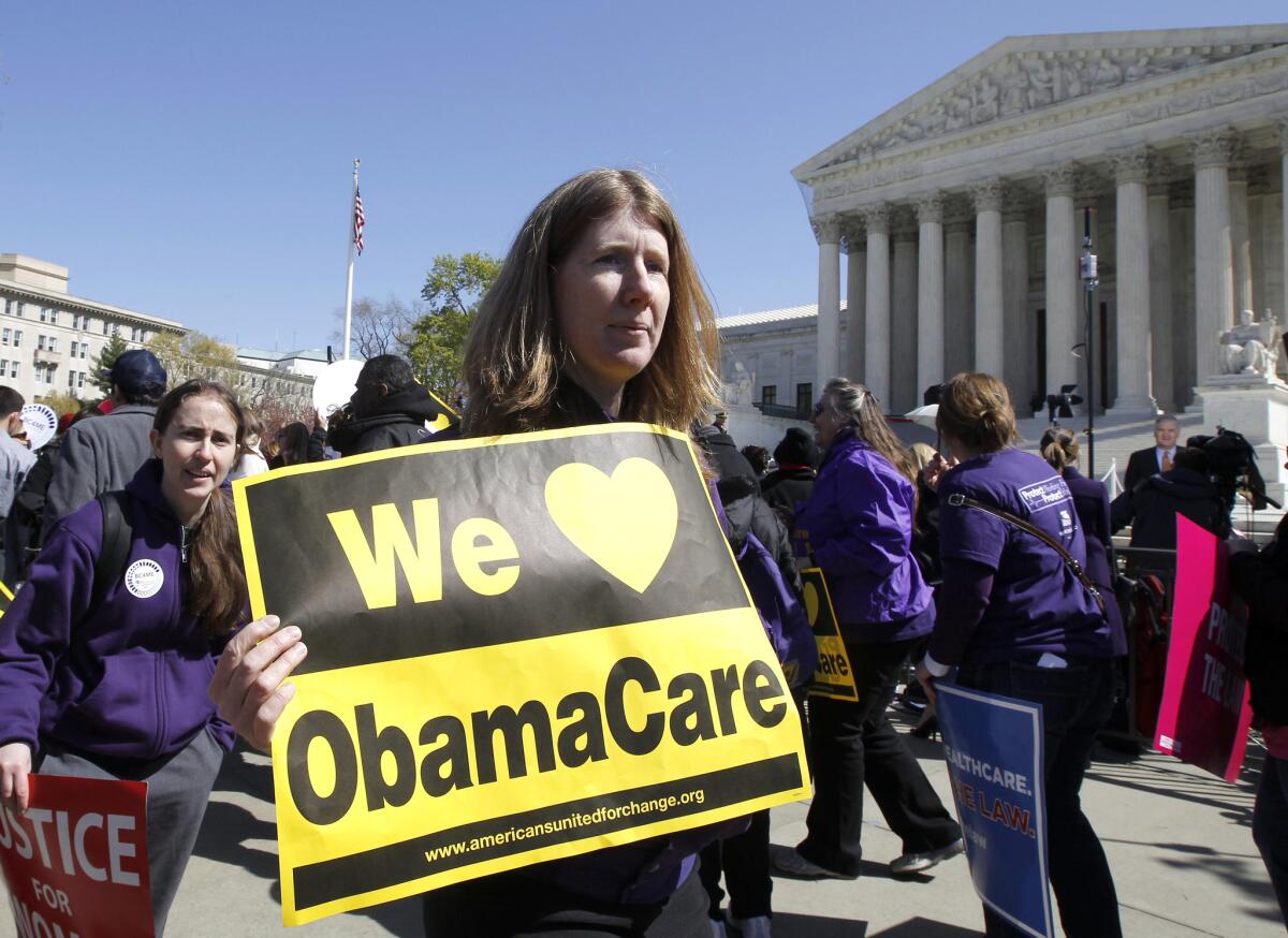 Obamacare supporters rally in front of the Supreme Court in 2012. The Court may take up the case again this year.