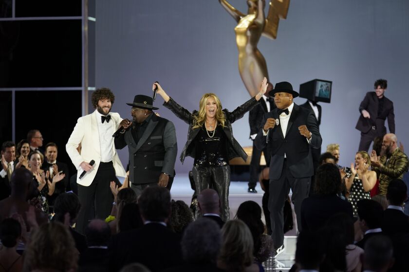 Cedric rhe Entertainer, Rita Wilson and LL Cool J appear at the 73RD EMMY AWARDS