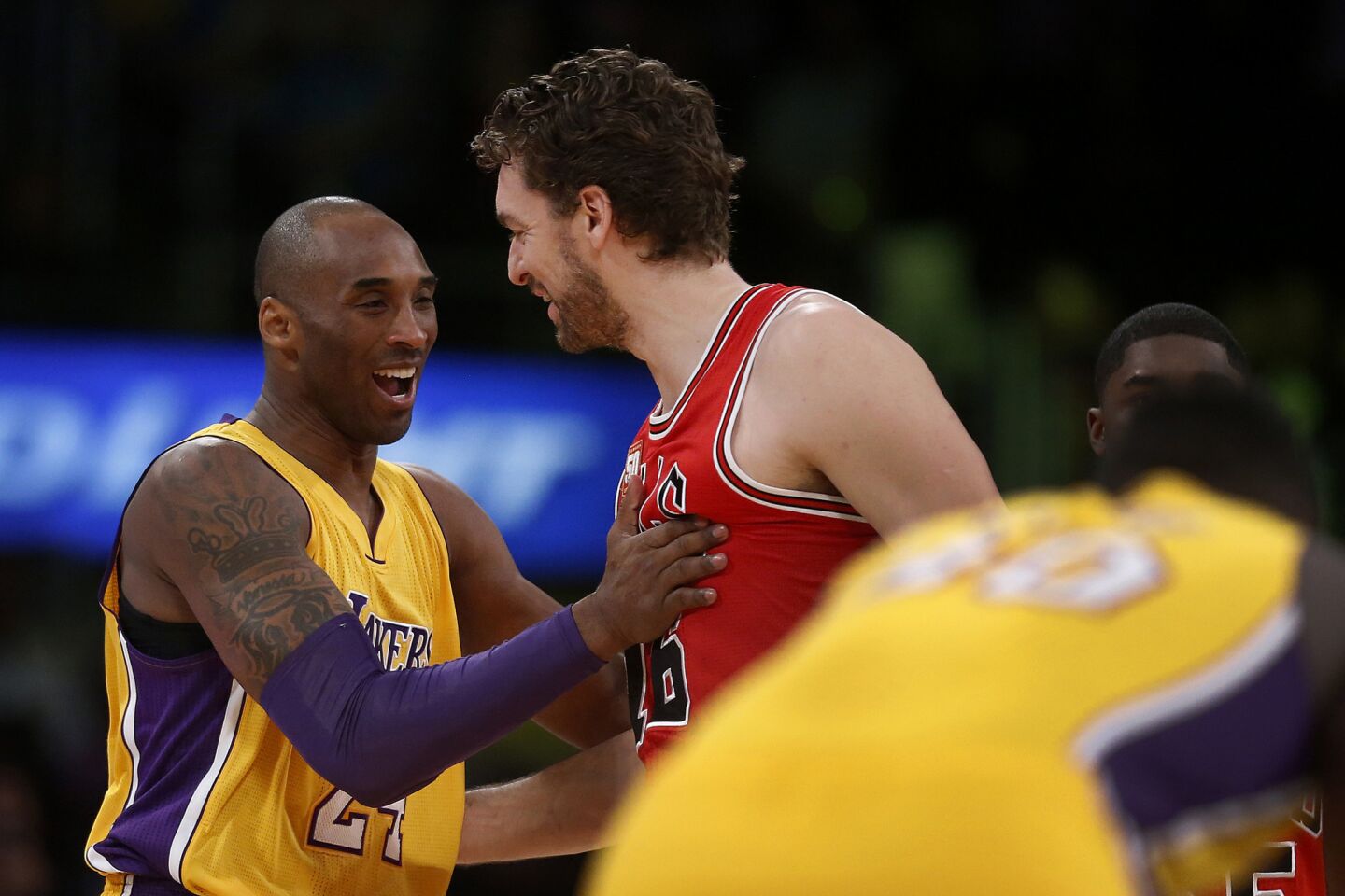Lakers star Kobe Bryant greets former teammate Pau Gasol before the game against the Bulls.