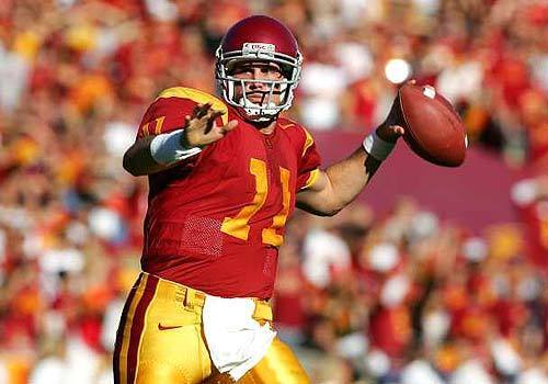 Matt Leinart #11 of the USC Trojans throws a pass in the first quarter against the UCLA Bruins.