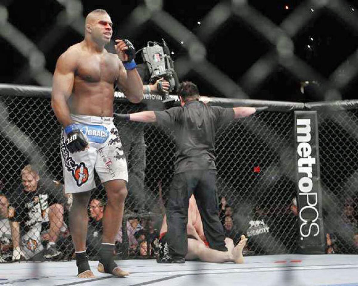 Alistair Overeem stands victorious after his first-round TKO over Brock Lesnar on Dec. 30.