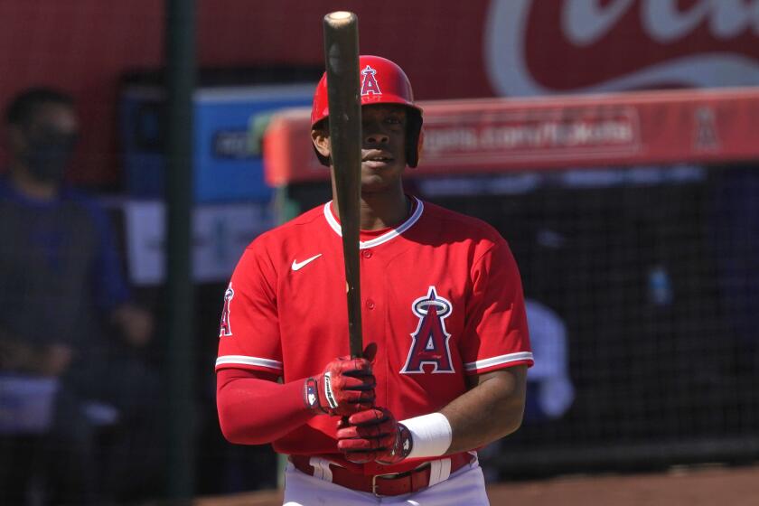 Los Angeles Angels left fielder Justin Upton against the Texas Rangers during the second inning of a spring training baseball game, Wednesday, March 3, 2021, in Tempe Ariz. (AP Photo/Matt York)