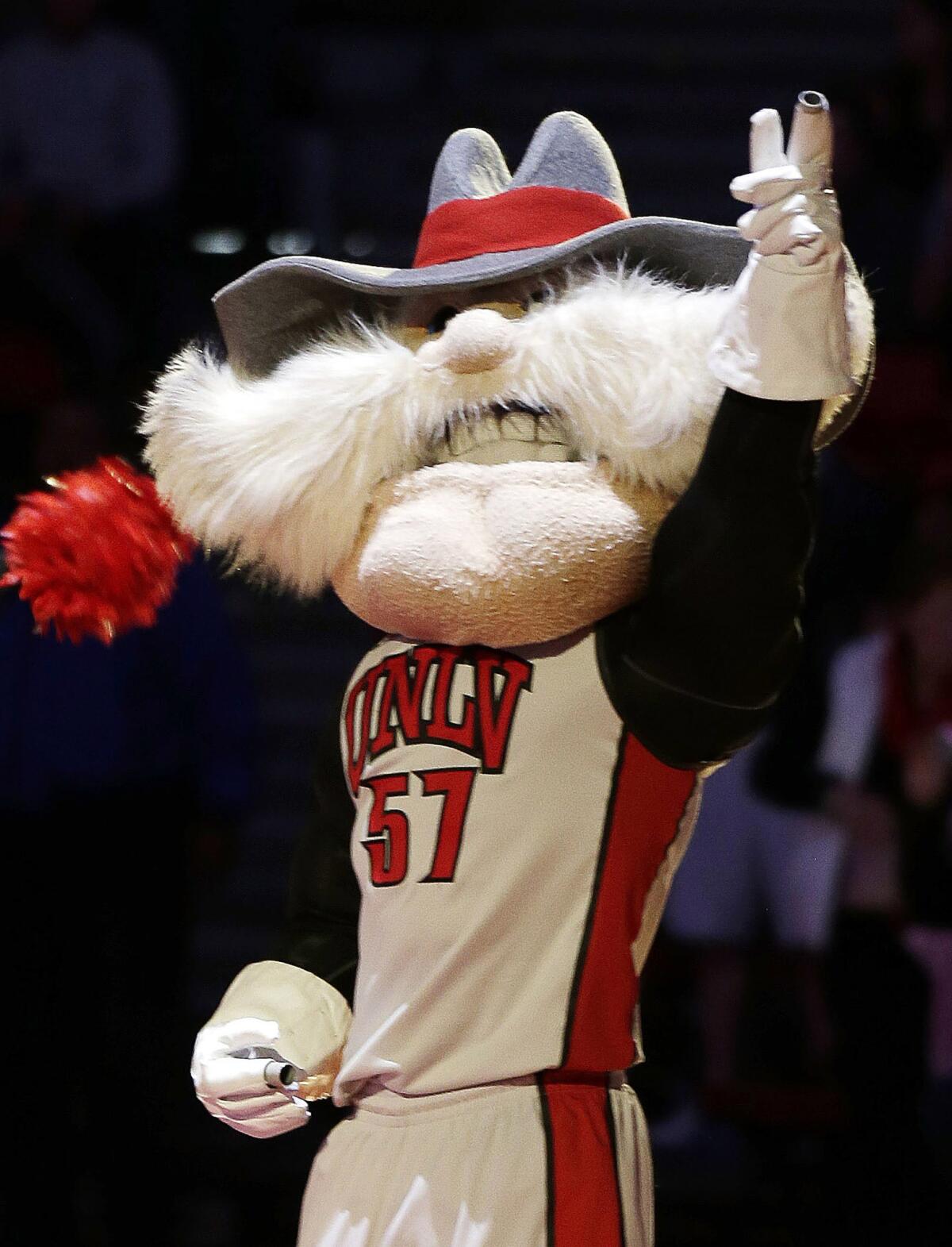 The University of Nevada Las Vegas mascot, Hey Reb! (exclamation mark included), warms up the crowd before a basketball game.