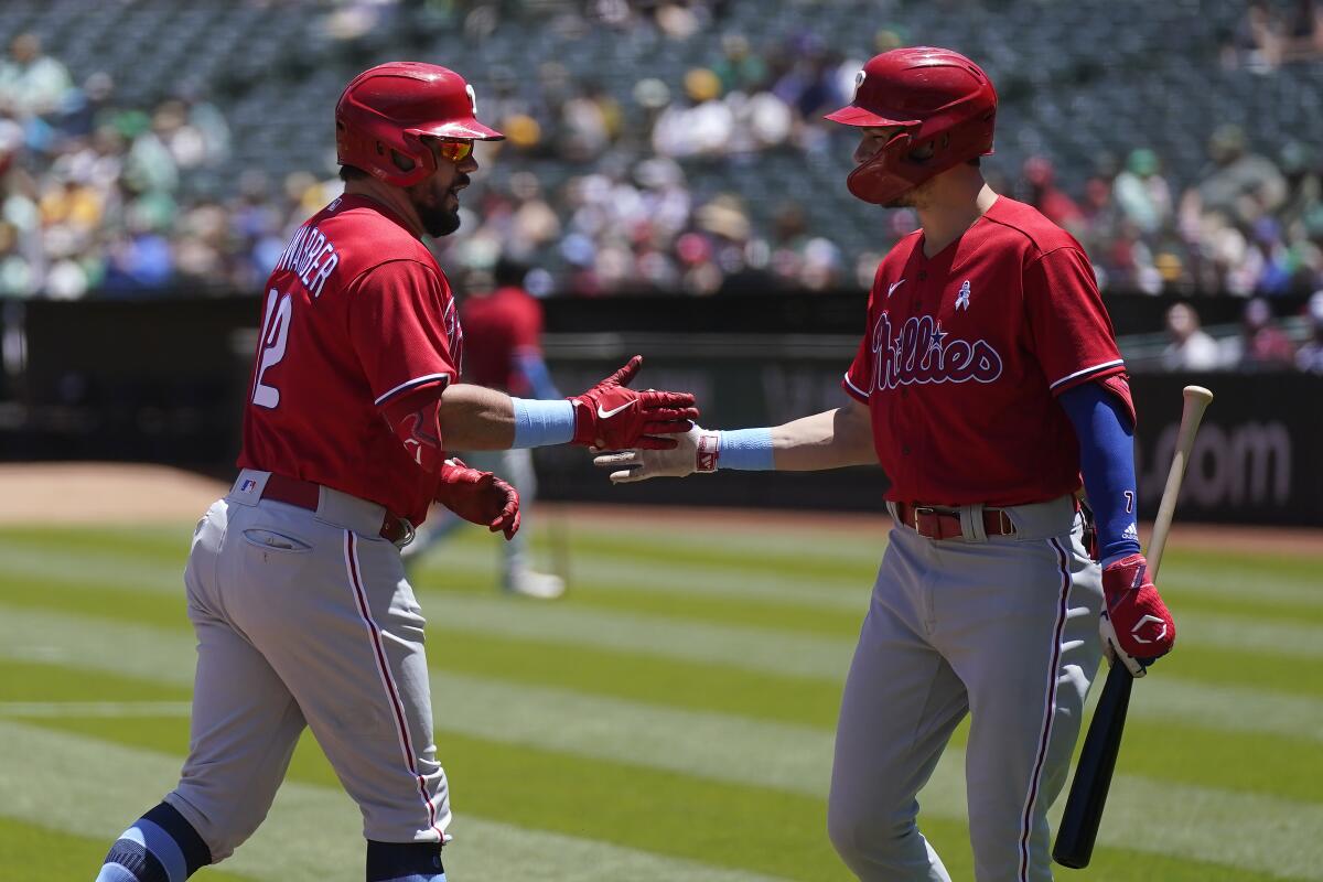 Nola, Schwarber lead Phillies to a 3-game sweep of Cardinals with