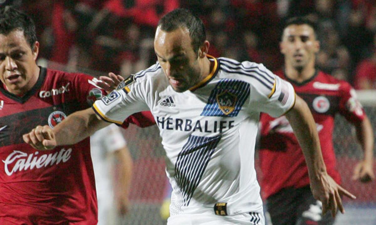 Galaxy forward Landon Donovan battles for control of the ball during a CONCACAF Champions League loss to Tijuana on March 18.