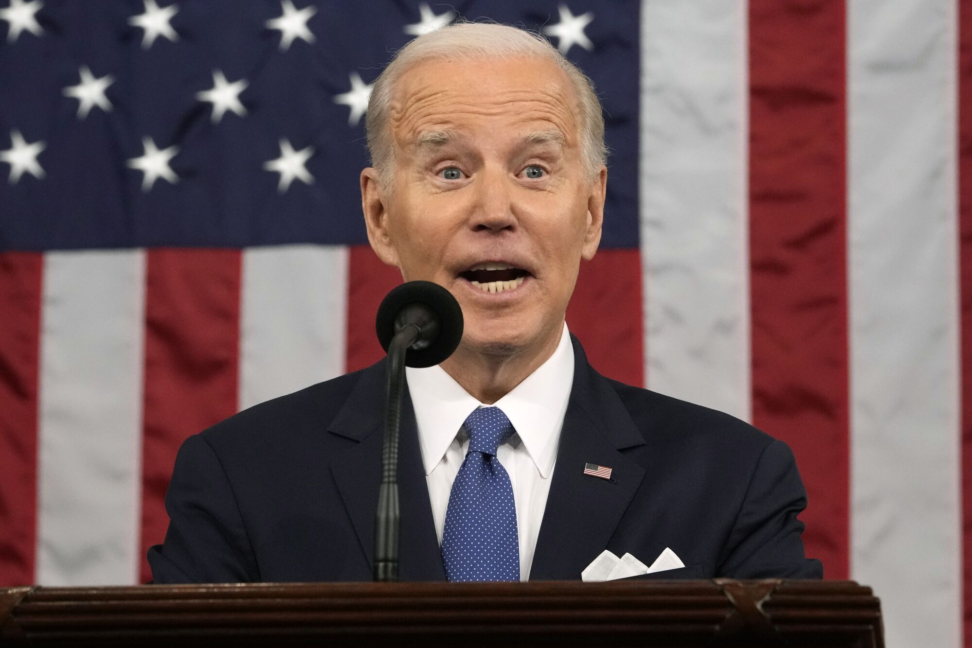 President Joe Biden speaks during a State of the Union address.