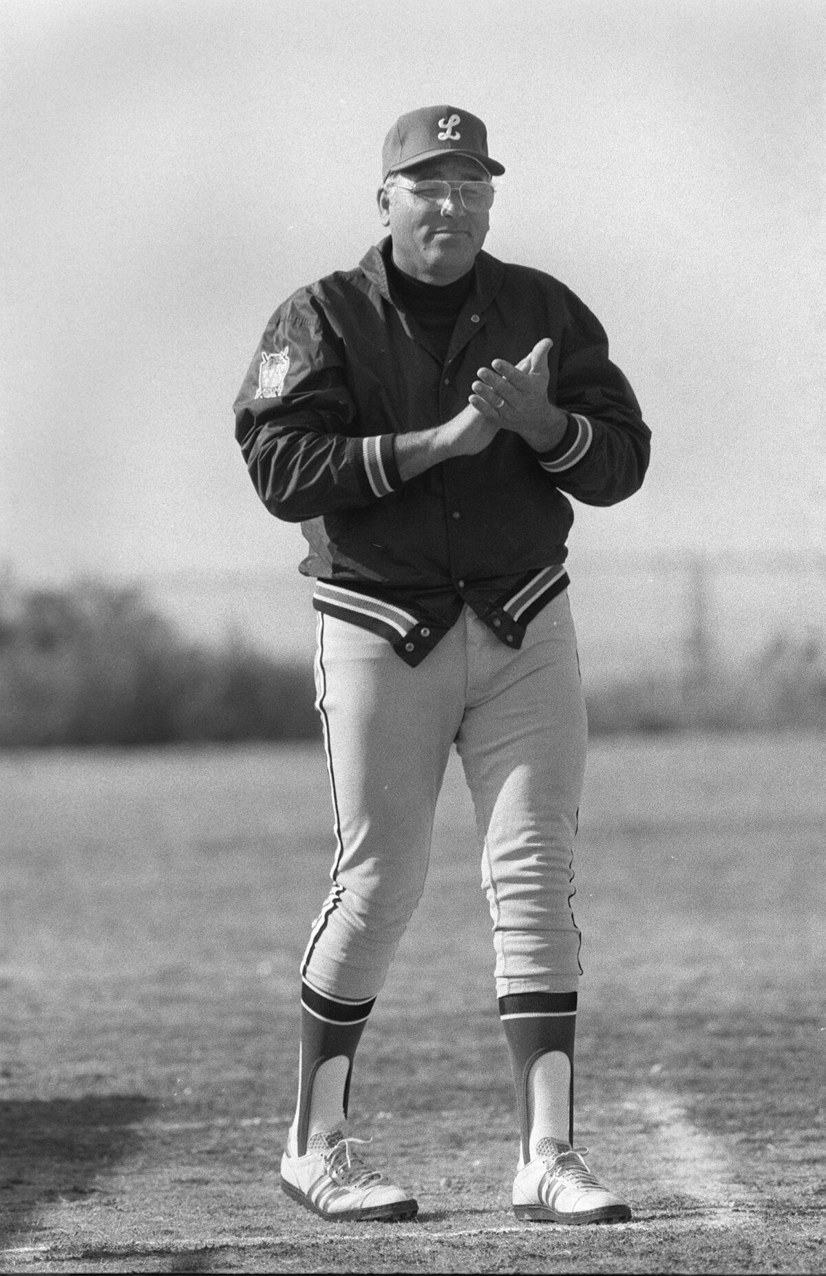 John Baumgarten coaching at third base for Hilltop in 1984.