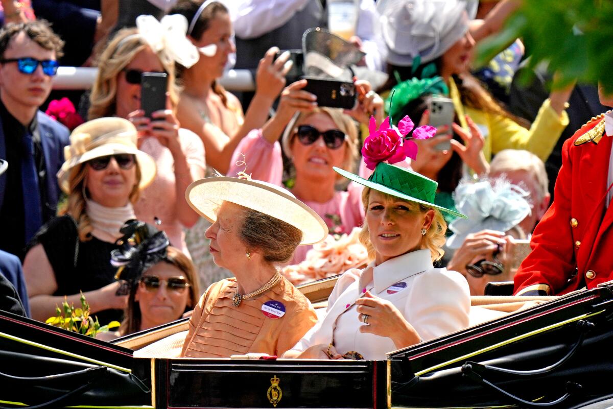 Britain's Princess Anne and her daughter, Zara Tindall,  arrive for the third day of the Royal Ascot in 2022.
