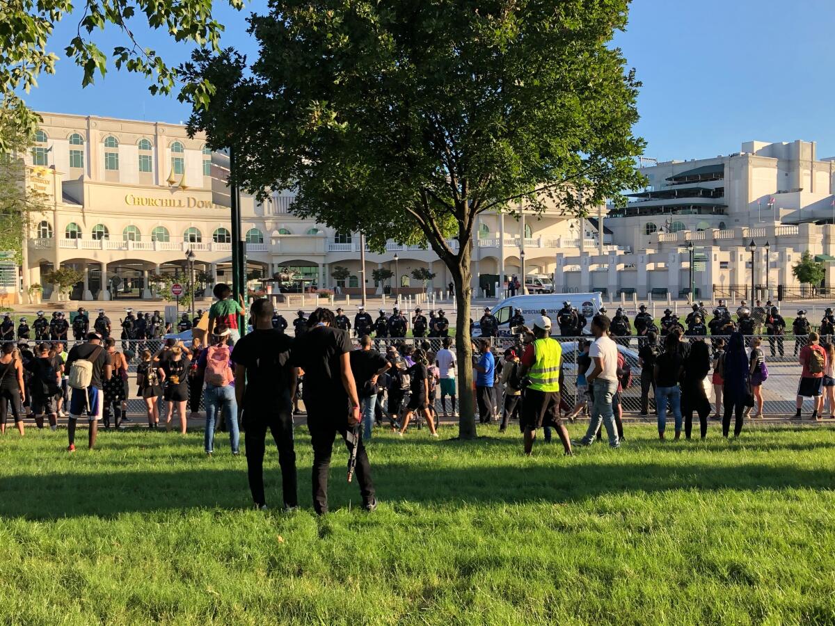 Black Lives Matter protesters, some legally armed with handguns and semiautomatic rifles, faced off with law enforcement.