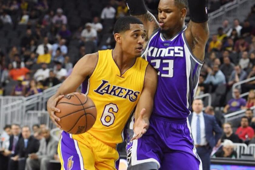 Lakers guard Jordan Clarkson drives against Sacramento's Ben McLemore during a game in Las Vegas on Thursday.