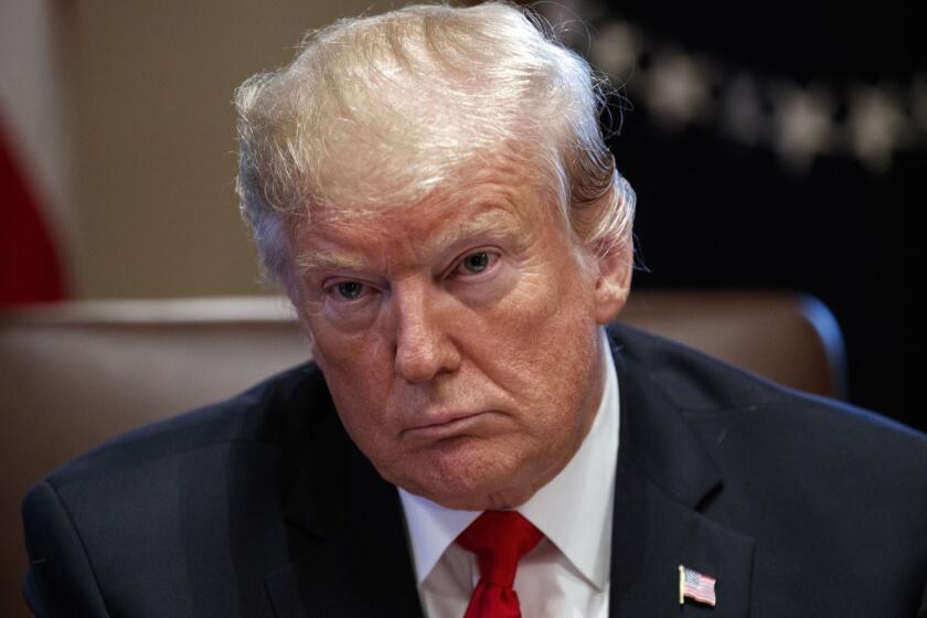 President Donald Trump listens during a cabinet meeting at the White House, Wednesday, Jan. 2, 2019, in Washington. (AP Photo/Evan Vucci)