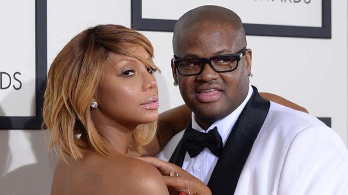 Tamar Braxton and Vince Herbert at the Grammys in 2014.