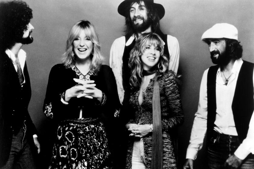 Fleetwood Mac pose for a portrait in circa 1977. 